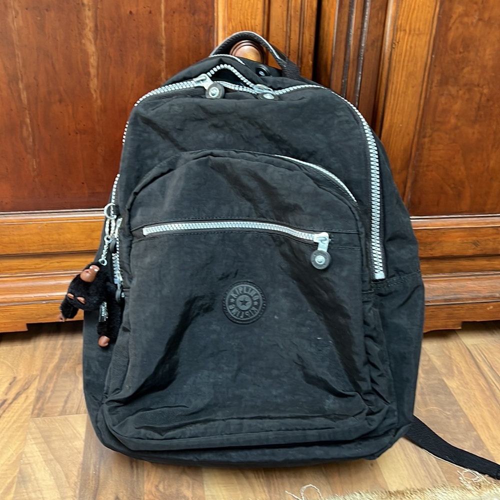Kipling black Backpack w monkey Davina. Clean inside and out. Black nylon